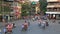 View of busy traffic in an intersection with many motorbikes and vehicles in Hanoi, capital of Vietnam.