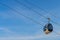 View of cableway gondola cable car on blue sky background