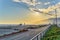 View of California coastal road at sunset.