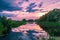 View of a calm lake in the evening