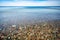 View of the calm sea from the beach, open space, horizon.