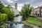 View of canal and  Galileo Astronomical Observatory La Specola Tower in Padova, Italy