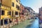 View of Canal Rio de Santa Fosca and bridge Ponte Vendramin in Venice. Italy