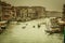 View of the Canal in Venice from Rialto bridge,gondolas are crossing the river and people enjoy their winter vacations