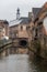 View of canals and streets of Gent town, Belgium in rainy day