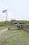 A view of a cannon and American Flag at Fort Barrancas at Naval Air Station Pensa