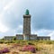 View of the Cap Frehel lighthouse and lilac heath meadows