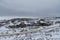 View of Cape Dorset, Nunavut with a layer of snow on the ground