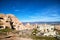 View on Cappadocia rock houses, caves and ruins in Goreme in Anatolia, Turkey. Ruins of an ancient city. The concept of the