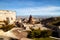 View on Cappadocia rock houses, caves and ruins in Goreme in Anatolia, Turkey. Ruins of an ancient city. The concept of the