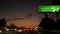 View from the car. Los Angeles busy freeway at night time. Massive Interstate Highway Road in California, USA. Auto driving fast