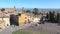 View of the car Park at the entrance to the historic part of Montalcino. Italy