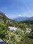 View on the car parking in Pregasina village and green Valle di Ledro valley , starting point of the hiking trail to Punta Larici