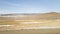 View from the car window at speed blurred view on the landscape of Siberia in the Irkutsk region of Russia. Steppes in winter