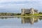 A view of the Carew River, Pembrokeshire and the ruins of the Norman castle