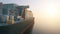 View of Cargo Tanker Ship Sailing Across the Ocean at Sunset.