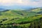 View of the Carpathian Mountains, several houses on the slopes of the hills