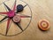 View a Carrom striker and carrom men balls on the carrom board. Play the game. Selective focus.