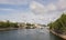 View of the Carrousel bridge. People walk along the Quay of the