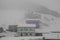 View of Castelluccio di Norcia during snowy winter day of January in Umbria