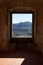 View of Castelo de Video Serra de Sao Mamede mountains landscape through the window of the castle, in Portugal