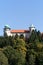 View on castle Nowy Wisnicz in Poland on a background of blue sky