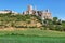 View of castle and sunflower fields in CalataÃ±azor, town of Castilla, Spain