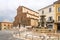 View at the Cathedral of Saint Peter the Apostle and fountain at the Liberty place in Faenza - Italy