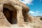 View of caves and dwellings carved by man into sandstone rock. Petra, Jordan