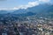 View on central part of Grenoble city from Bastille fortres witn mountains around, old cable car, Isere, France