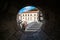 View of the central square of Dubrovnik through a round window in the fortress wall. Resorts of Croatia