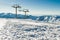 View chairlift at ski resort with mountain range on background. Extreme sport. Active holiday. Free time, travel concept. Copy spa