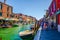 view of a channel on murano island in italy which is surrounded with tourist shops selling famous murano glass...IMAGE