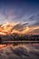 View on Charles Bridge and Prague Castle over Vltava River during early night with wonderful dusk sunset