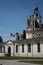 View of Chateau Chambord entrance with french flag.