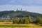 View of a Checiny with Royal Castle on hill over town