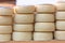 View of cheeses stacked in traditional market