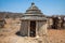 A view of chickens finding shade in a Himba tribe village in Namibia