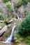 View of Chorros de Joyarancon waterfall in Santa Ana la Real village, Huelva, Andalusia, Spain