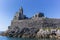 View of the church and castle of Porto Venere in Italy from the sea