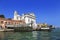 View of the church of Gesuati or Santa Maria del Rosario from the Grand Canal, the cafe and the vaporetto stop `Zattere`. Venice