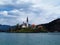 View of the church on the island on lake Bled and Bled castle