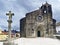 View of the church of Santa Maria del Azogue in Gothic style built in the second half of the XIV century, and stone cross views f
