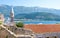 View of Church of St Ivan, Budva old town, mountains and sea. Montenegro