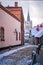 View of the Church of St. John from the old streets of the small town of Cesis. Latvia.