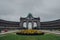 View of Cinquantenaire monumental triple arch in Parc du Cinquantenaire park in Brussels, Belgium