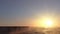 View of the city on the bay. Beautifull sunset. Realistic water animation