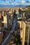 A view of the city of Bogota from the top of the Colpatria building, with big avenue surrounded by office buildings and view of