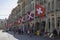 View of the city center of Bern with original flags of Switzerland and Bern, Switzerland