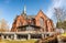 View of the City Church built in red bricks, ready year 1894. Umea, Northern Sweden. Sunny spring day with blue skies